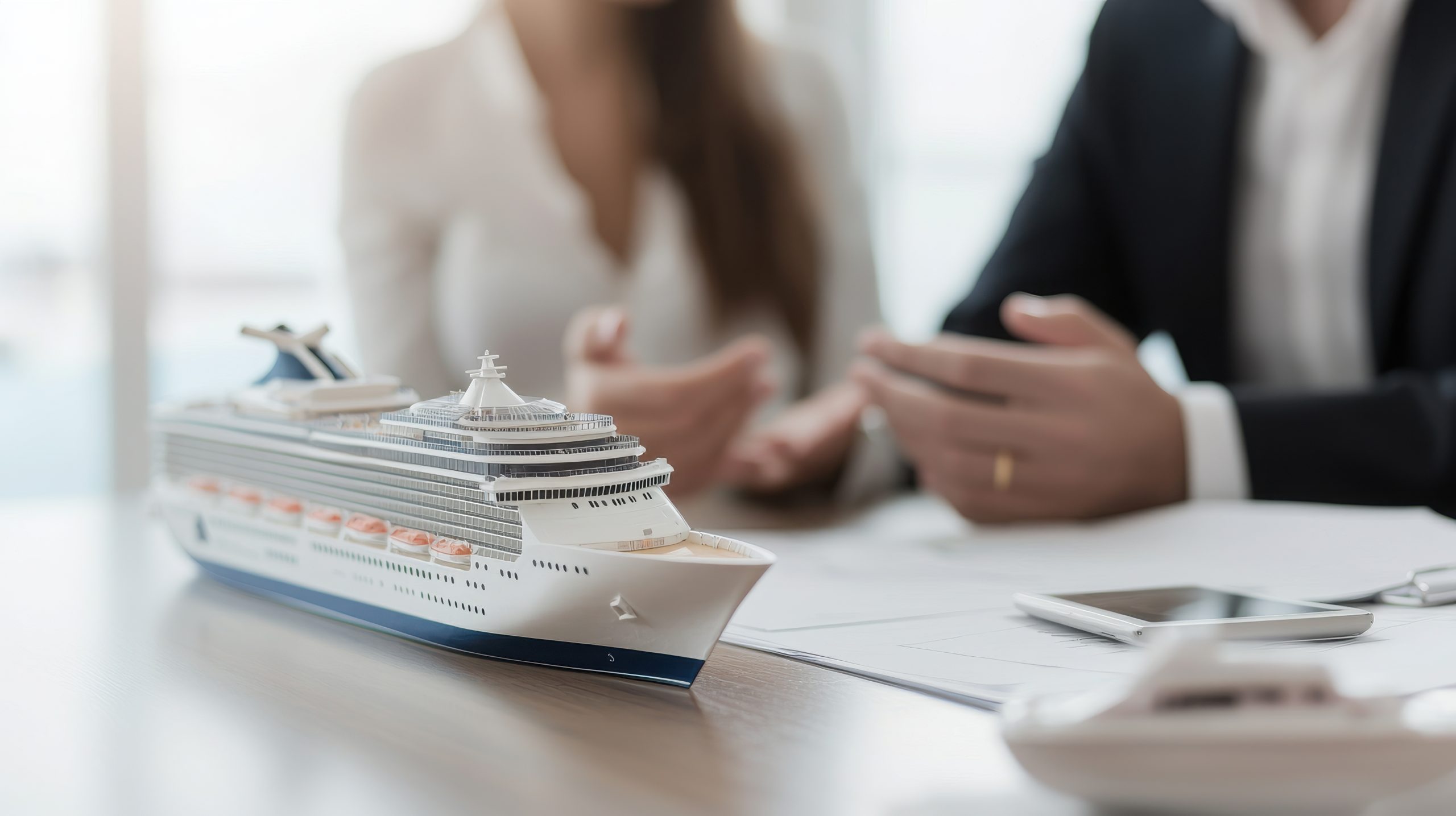 Cruise travel advisor reviewing itinerary options with clients.